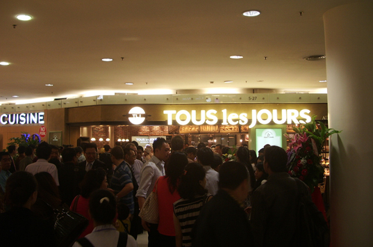 Customers crowd into the 1st Tour Les Jours store in Indonesia 1